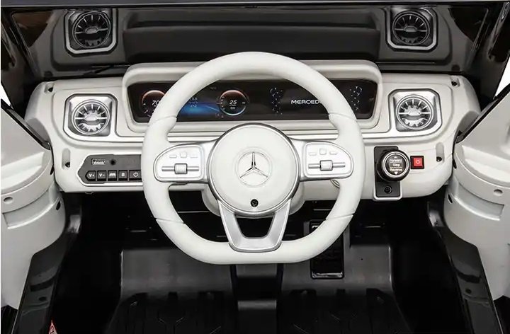 Masinuta electrica pentru copii Mercedes Benz EQG White 110w cu echipare premium,acumulator 12V9Ah,roti eva,scaun piele perforata,telecomanda 2.4G,deschidere usi,lumini led,baterie detasabila,oglinzi retrovizoare cu lumini – imaginea 4